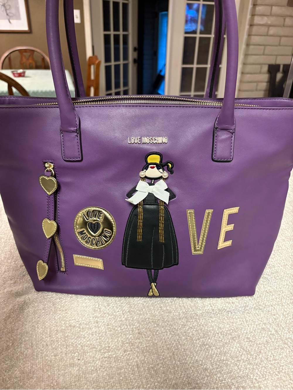 Love Moschino Purple Tote with Gold‎ Appliqué and Charms/Needs repairing!